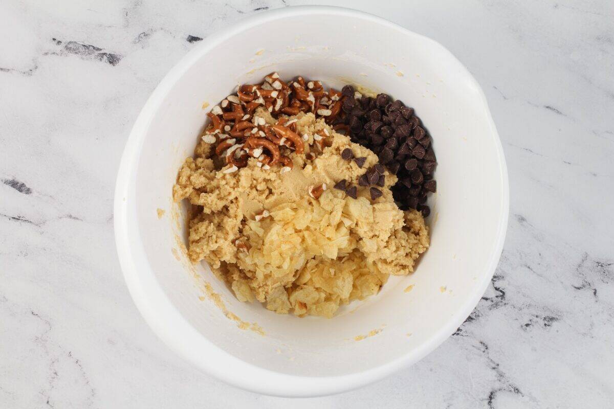 Kitchen sink cookie dough with pretzels, chocolate chips, and potato chips.