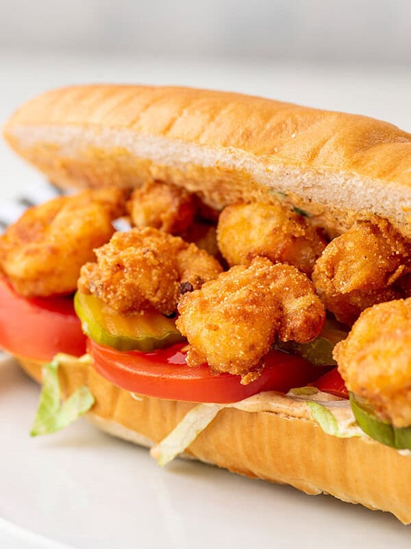 close up section of shrimp po boy sandwich