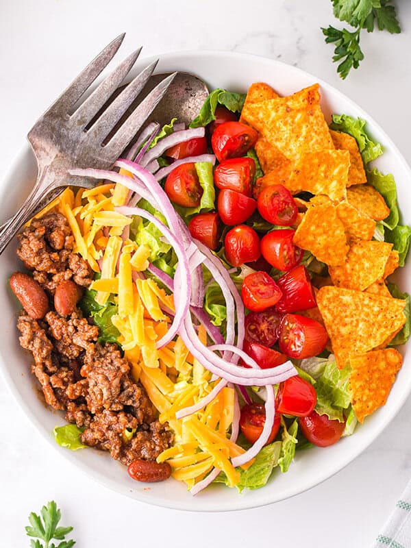 overhead taco salad in white bowl