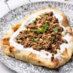 Indian keema on yogurt naan bread