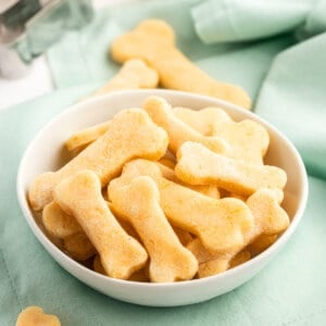 homemade cheddar dog biscuits in white bowl