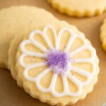 cut out sugar cookie iced with flower decoration