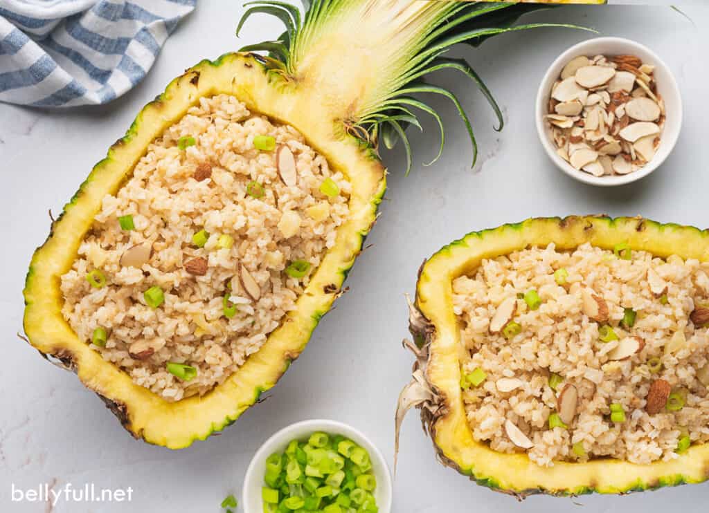 tropical rice inside hollowed out pineapple halves