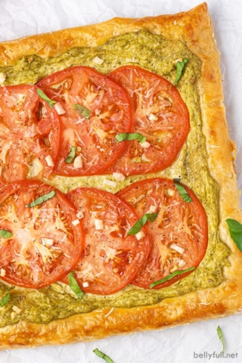 overhead baked tomato tart on parchment paper