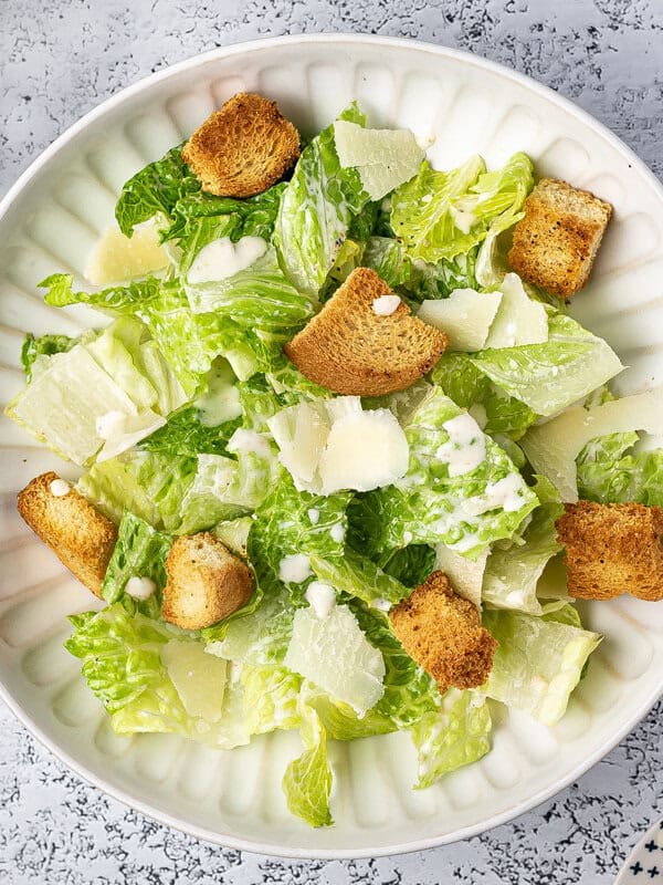overhead Caesar Salad on white plate