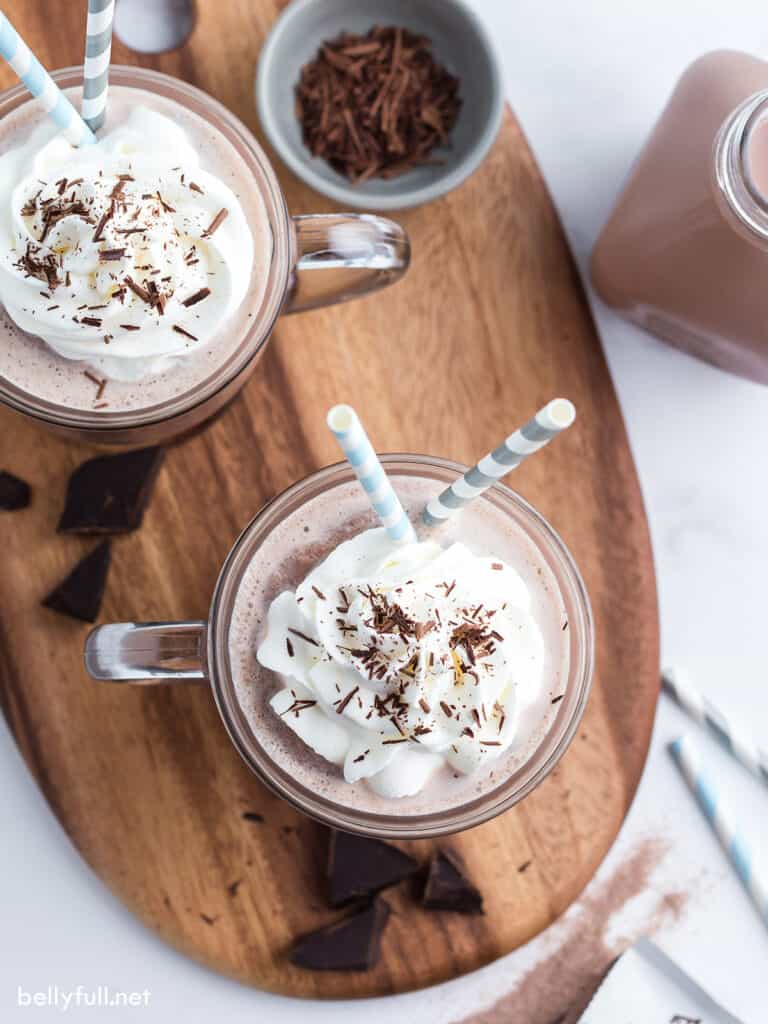 overhead chocolate drink topped with whipped cream and chocolate shavings