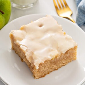 square slice of caramel apple sheet cake on plate
