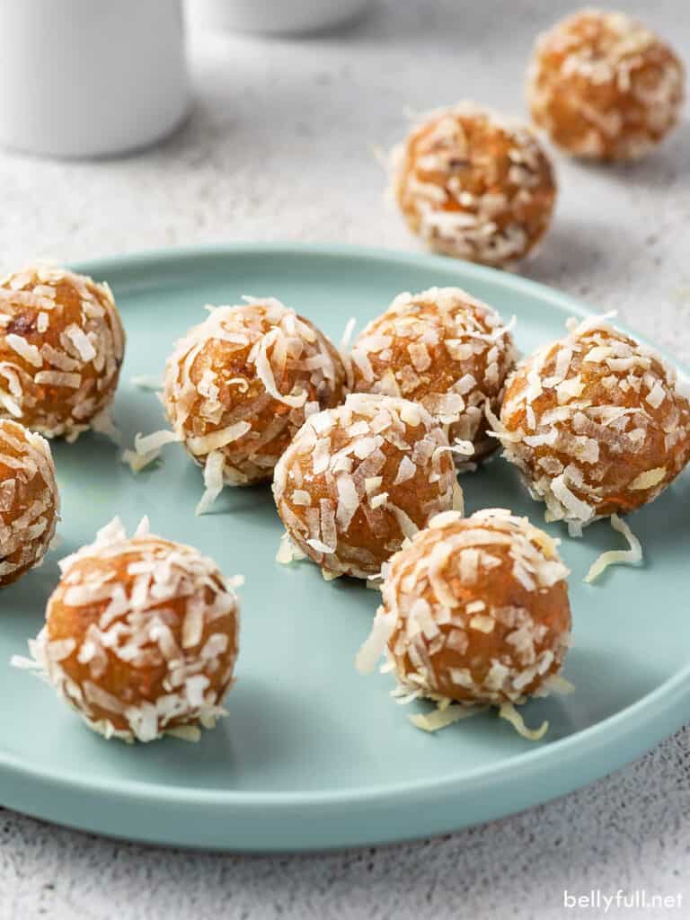 several carrot cake energy bites on a plate