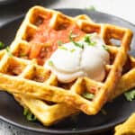 2 stacked chaffles with sour cream and salsa