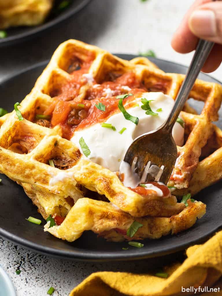 fork bite of cheese and egg waffles