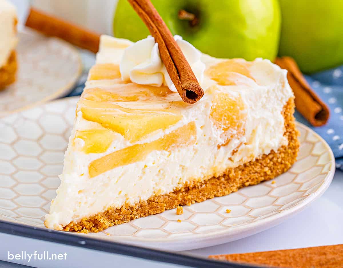 A slice of no bake apple cheesecake on a plate