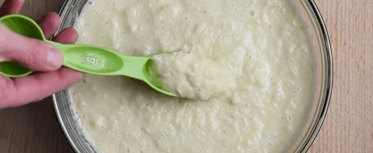 Portioning latke batter for frying.