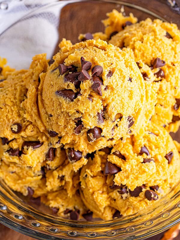 A bowl of scoops of pumpkin edible cookie dough
