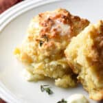 2 apple cheddar drop biscuits with melted butter