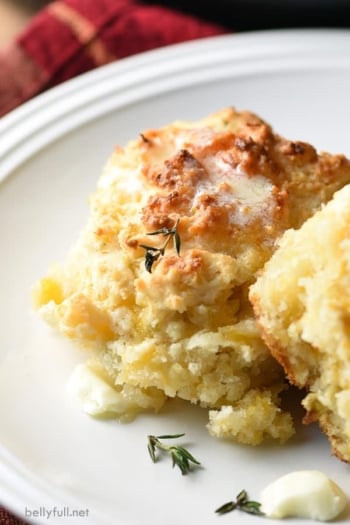 2 apple cheddar drop biscuits with melted butter