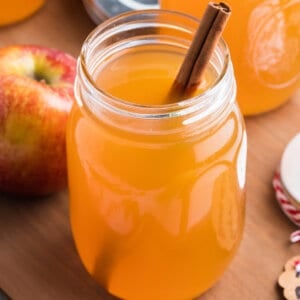 A mason jar of apple pie moonshine
