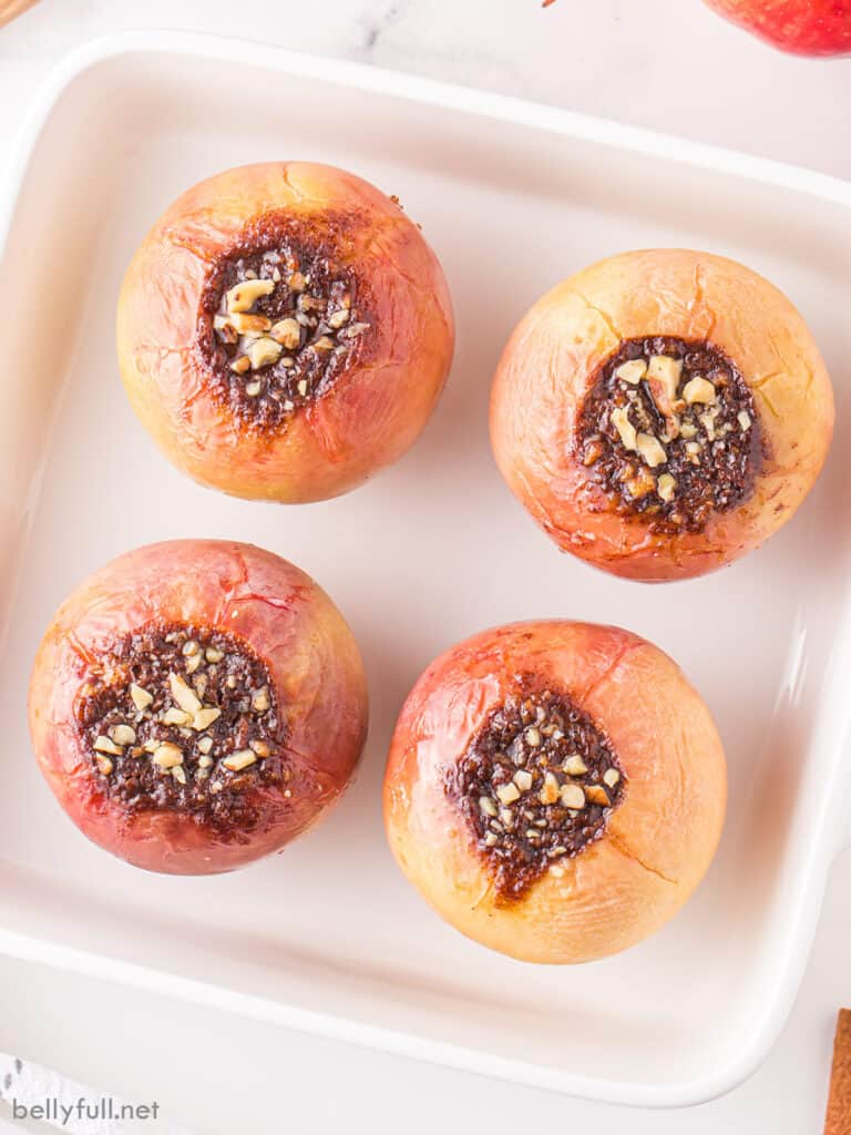 4 baked apples in square baking dish