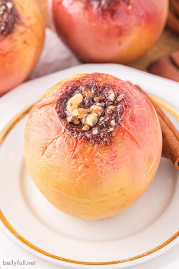 stuffed Honeycrisp baked apple on white plate