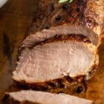 sliced roasted pork tenderloin with fresh rosemary