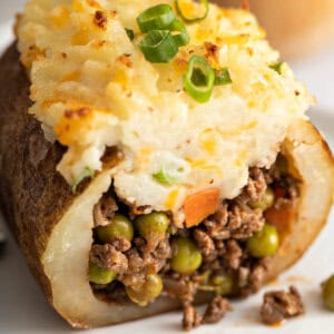 close up shepherd's pie twice baked potato cut in half