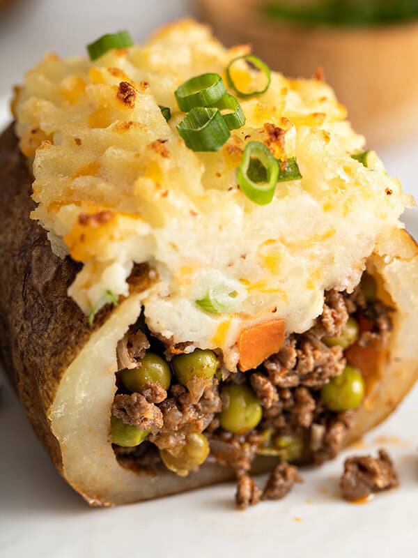 close up shepherd's pie twice baked potato cut in half
