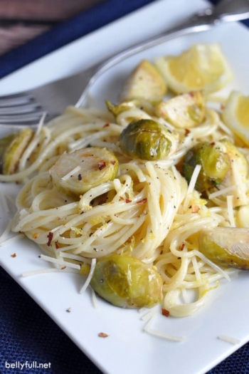 creamy lemon pasta with brussels sprouts on plate with fork