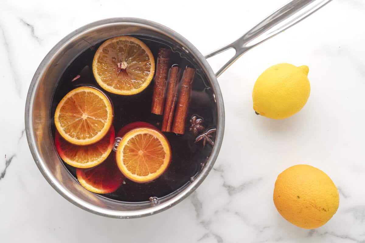 Ingredients for mulled wine simmering. 
