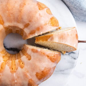 Overhead view of Kentucky butter cake with one piece sliced