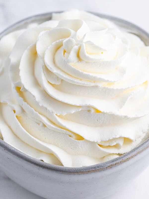 swirled whipped cream in bowl
