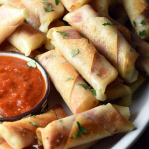 baked wonton wrappers stuffed with salami and mozzarella