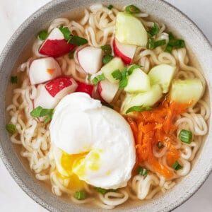 Close overhead view of a bowl of hot and sour ramen soup