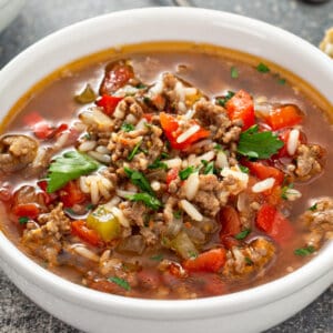 A white bowl of easy stuffed bell pepper soup