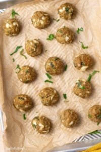 Overhead view of turkey meatballs on a baking sheet