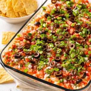 Overhead view of 7 layer dip in a casserole dish