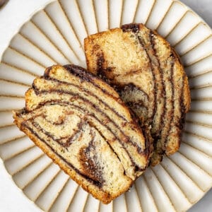 Overhead view of two slices of chocolate babka
