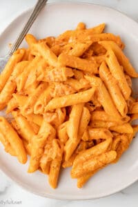 Vodka sauce pasta on a white plate