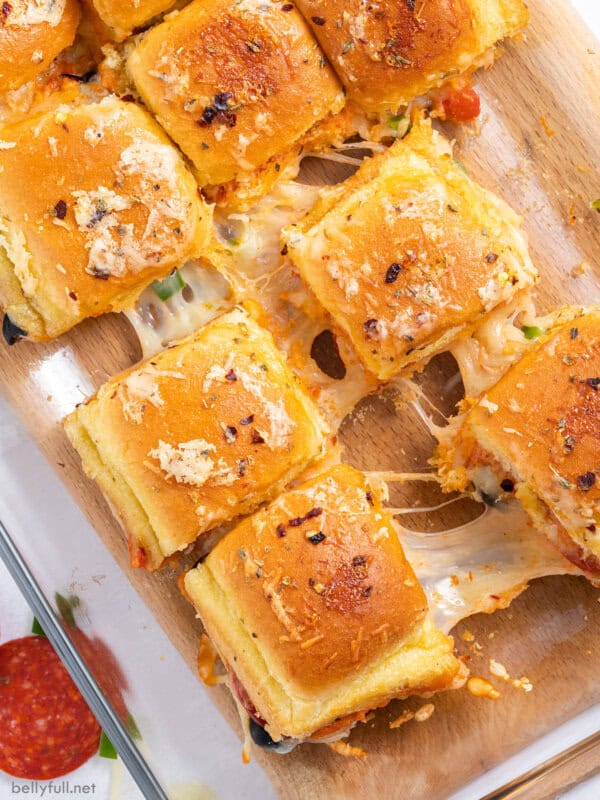 overhead pizza supreme sliders pulled apart with gooey cheese