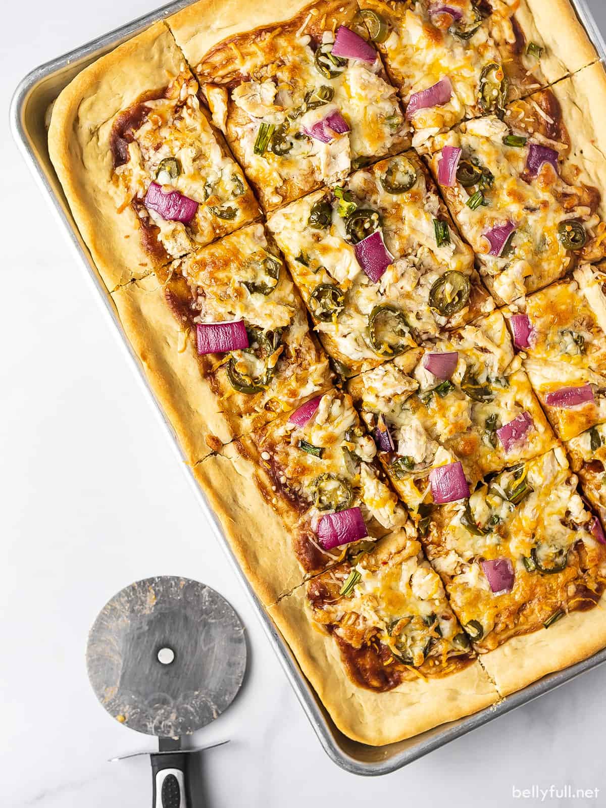 Overhead view of a BBQ chicken pizza