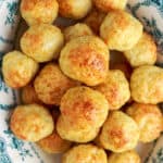 Overhead view of chicken meatballs in a blue and white dish