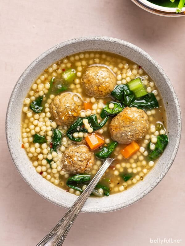 Overhead view of a bowl of Italian wedding soup