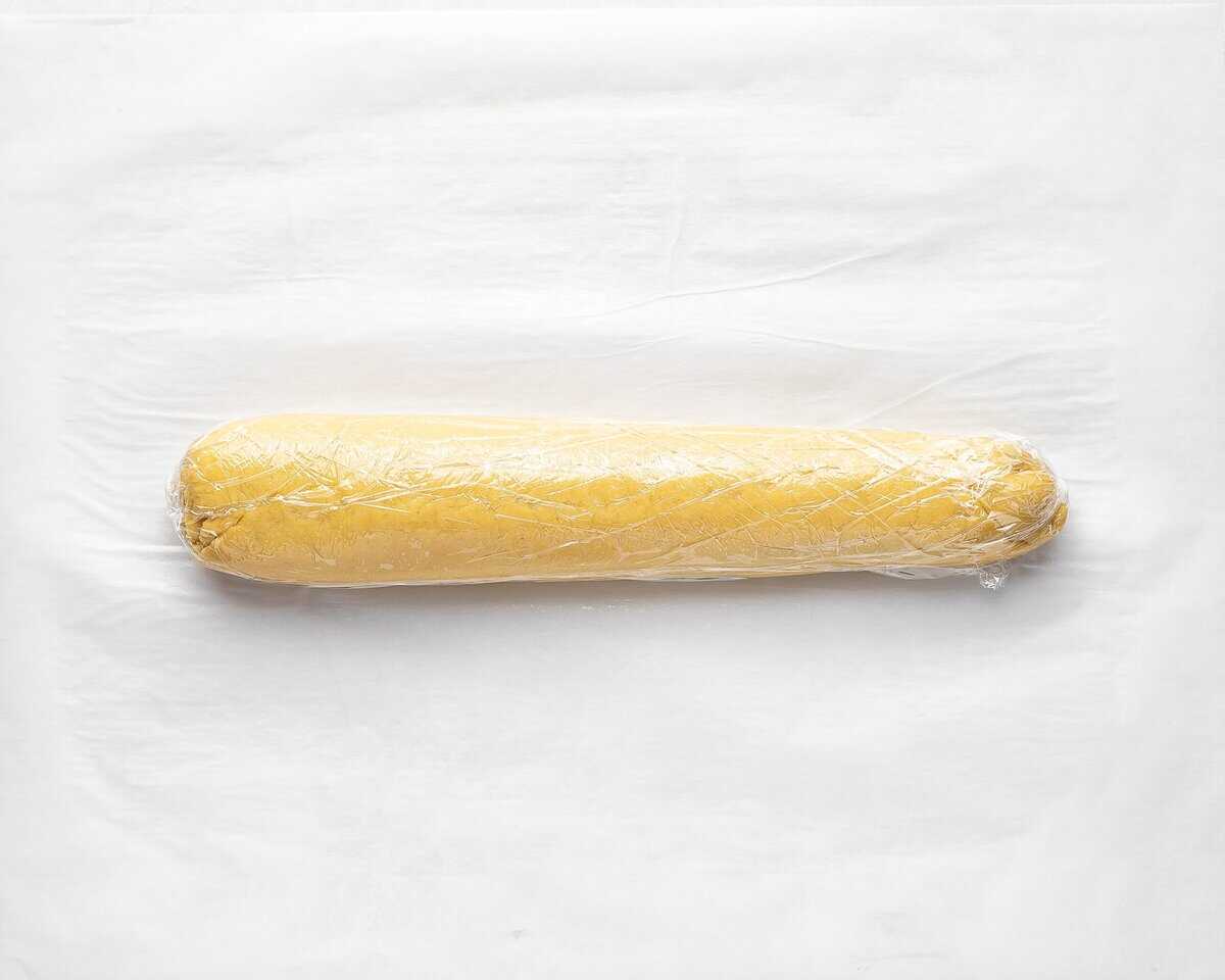 Dough wrapped in plastic wrap.