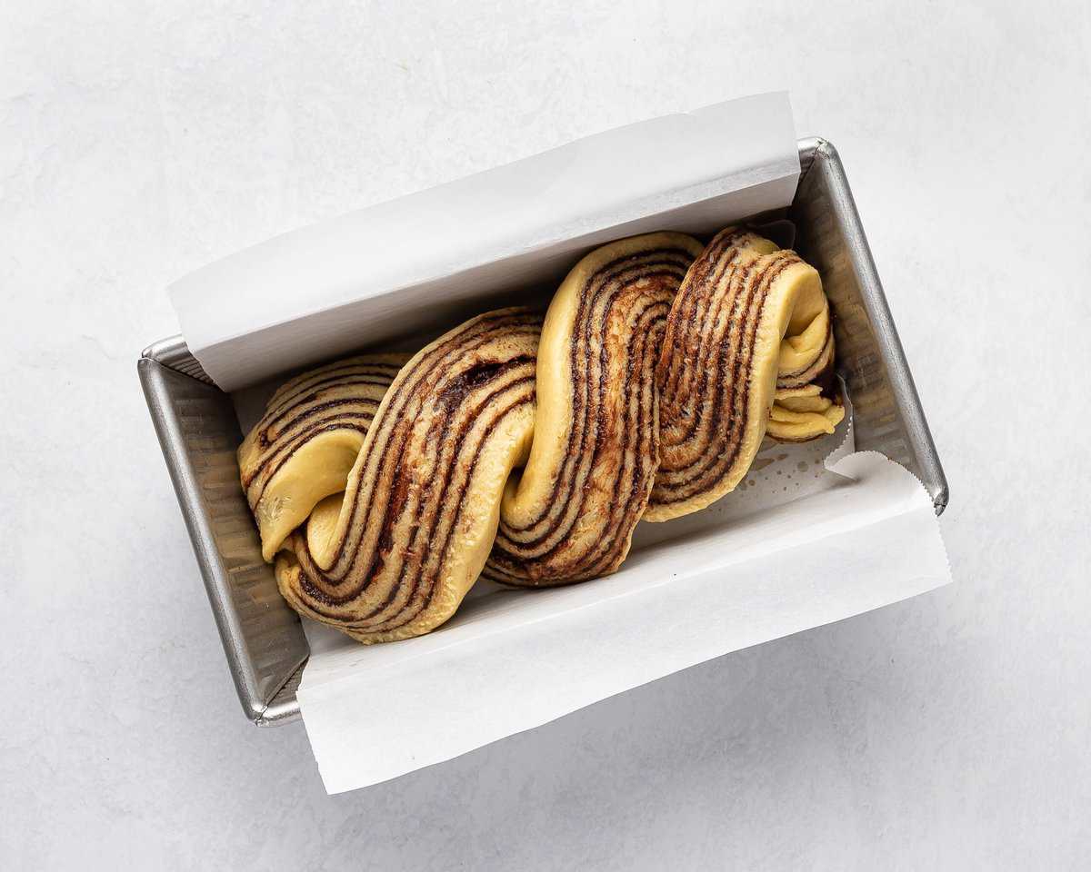 Twisted dough in the loaf pan.