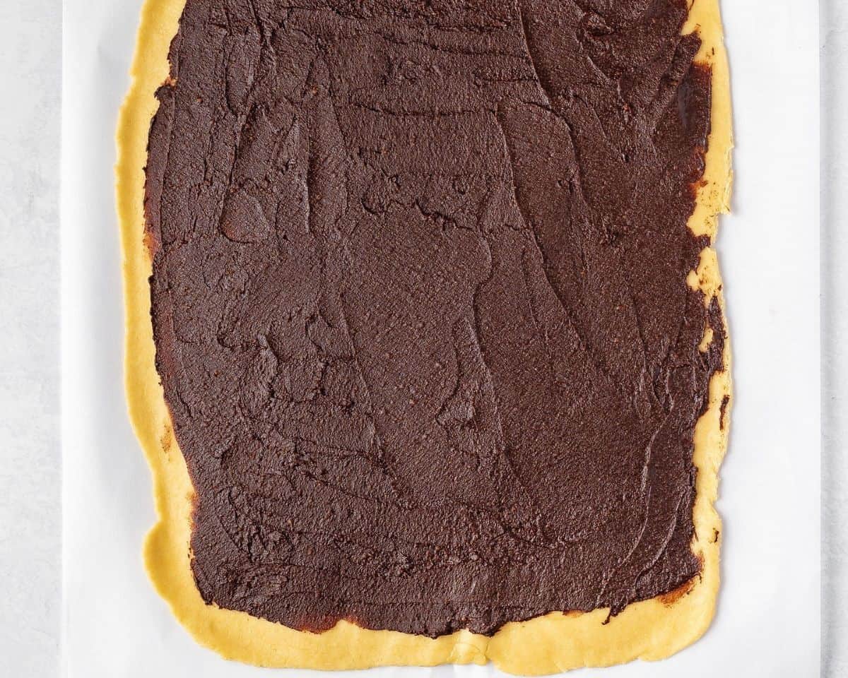 Babka dough with chocolate filling over it.