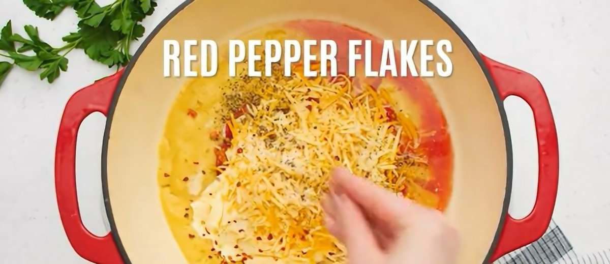 Ingredients to make chicken spaghetti in a pot.