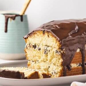 sliced coconut layered pound cake with chocolate ganache