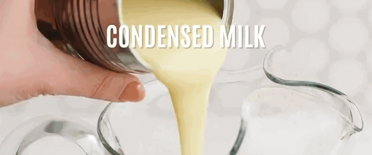 Adding milk to the strained rice mixture.