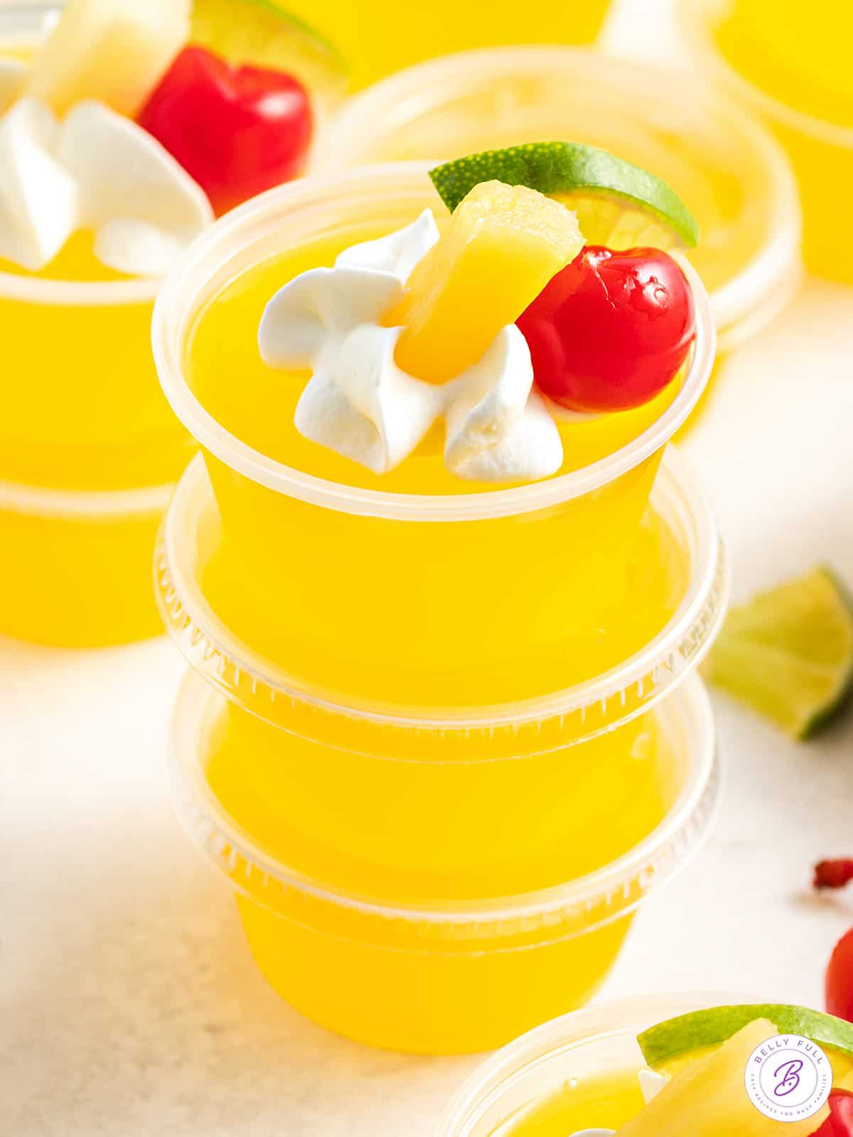 stack of 3 pineapple mai tai jello shots