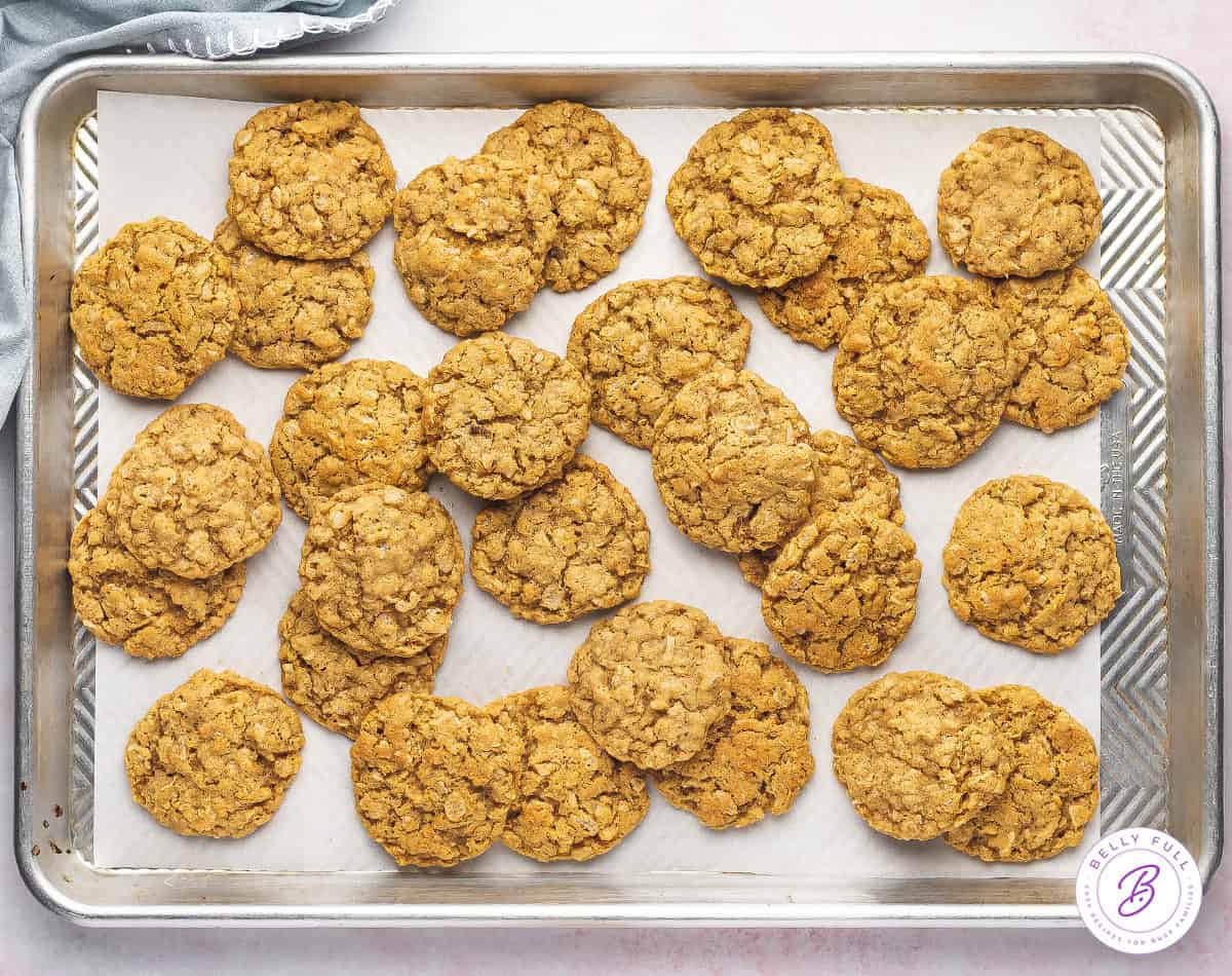 Overhead view of ranger cookies on a baking sheet