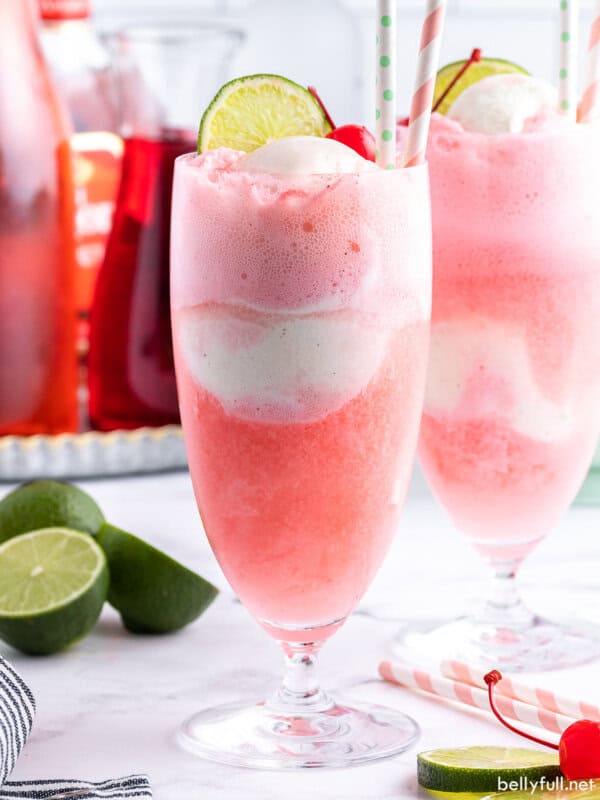 shirley temple ice cream float with straw and a lime wedge