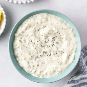 Overhead view of a blue bowl of tartar sauce